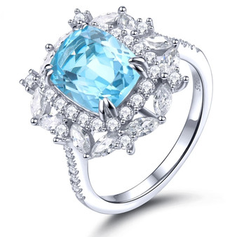 sky blue topaz and white zircon ring in rhodium over sterling silver