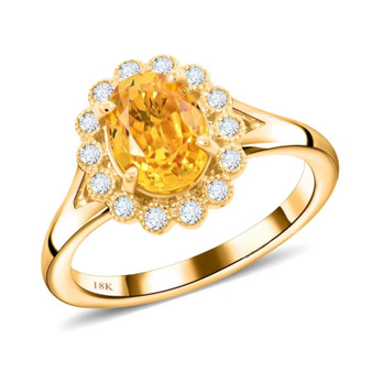orange sapphire and diamond halo ring in 18k yellow gold
