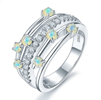 ethiopian opal and white zircon openwork ring in rhodium over sterling silver