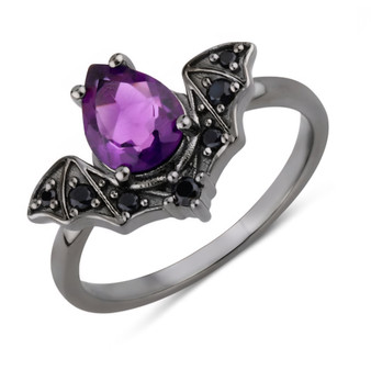 angled view amethyst and black spinel bat ring in black rhodium over sterling silver