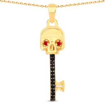 front view of key pendant with black spinel and ruby eyes in 18k yellow gold over sterling silver