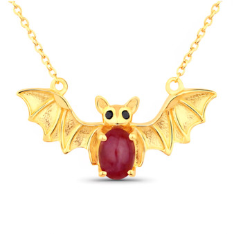 front view of bat necklace oval with ruby and black spinel in 18k yellow gold over sterling silver