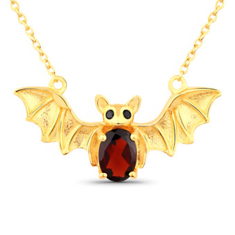 front view of bat necklace oval with garnet and black spinel in 18k yellow gold over sterling silver