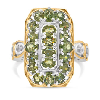 front view of the demantoid garnet cluster open work two tone ring displaying a rectangular green demantoid garnet cluster framed by two tone gold and rhodium detailing front view of the demantoid garnet cluster open work two tone ring displaying a rectangular green demantoid garnet cluster framed by two tone gold and rhodium detailing