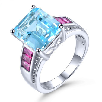 natural sky blue topaz and rhodolite garnet ring in rhodium over 925 sterling silver