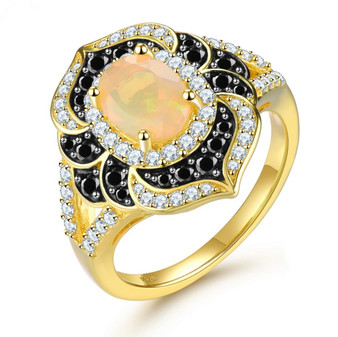 ethiopian opal black spinel and white zircon ring in 18k yellow gold over sterling silver