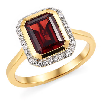 emerald cut garnet and moissanite halo ring in yellow gold over sterling silver