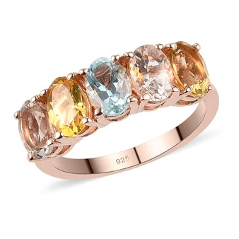 front view of aquamarine and morganite heliodor five stone band ring in 18k rose gold over sterling silver