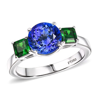 front view of tanzanite and tsavorite garnet three stone ring in 950 platinum