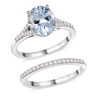 aquamarine and oval moissanite bridal ring set in rhodium over sterling silver