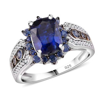 front view of kyanite sapphire and zircon halo ring in two-tone rhodium over sterling silver