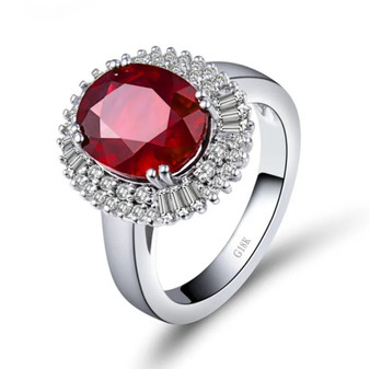 lab ruby and diamond halo ring in 18k white gold