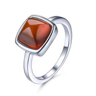 front view of hessonite garnet cabochon sugar loaf solitaire rhodium over sterling silver ring