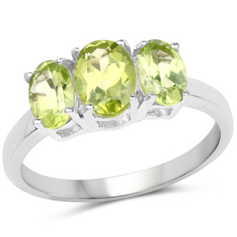 oval cut peridot trilogy ring in rhodium over sterling silver