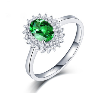 front view of tsavorite garnet and diamond halo 14k white gold ring