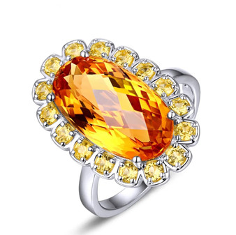 front view of citrine and yellow sapphire 14k white gold halo cocktail ring
