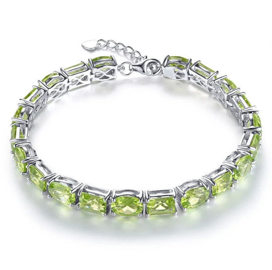 peridot mixed oval and emerald cut tennis bracelet in rhodium over sterling silver