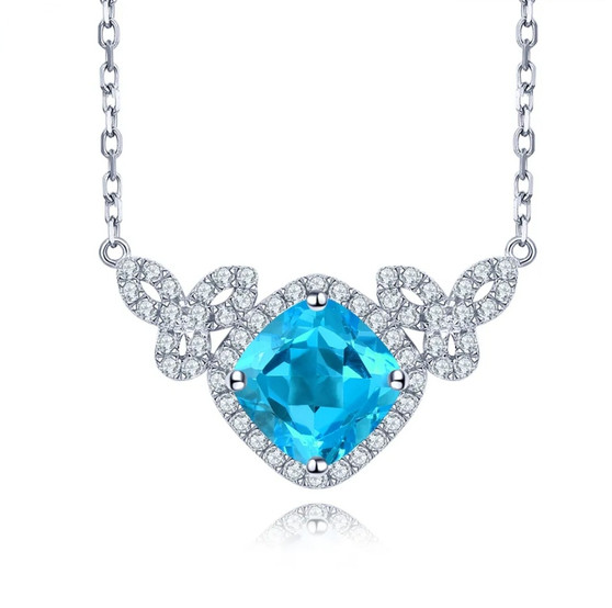 swiss blue topaz and white zircon station necklace in rhodium over sterling silver