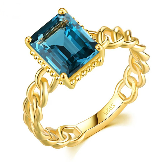 london blue topaz chain link solitaire ring in 18k yellow gold over sterling silver