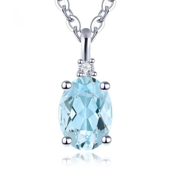 front view of aquamarine oval and diamond solitaire pendant necklace in 10k white gold