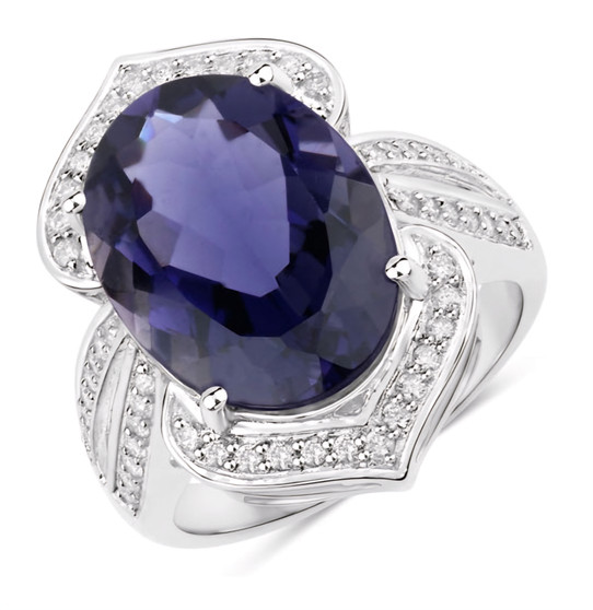 front view of oval iolite and white diamond ring in 14k white gold