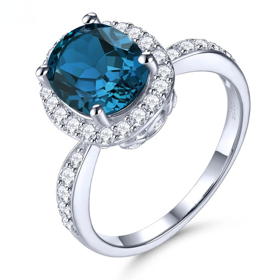 womens natural london blue topaz and white zircon halo ring in rhodium over 925 sterling silver