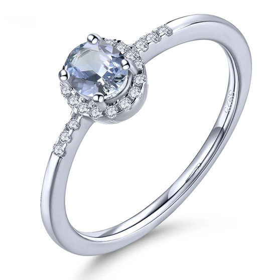 tanzanite and white zircon halo ring in rhodium over sterling silver
