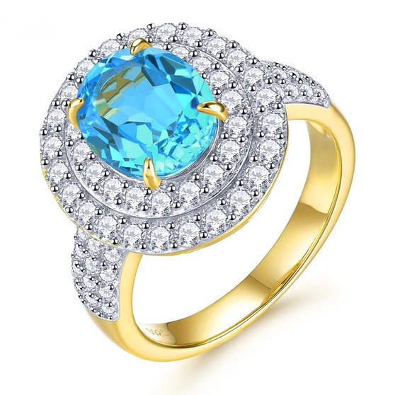 swiss blue topaz and white zircon double halo ring in 18k yellow gold over sterling silver