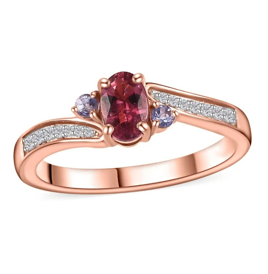 rubellite tourmaline tanzanite and white zircon three stone bypass ring in 18k rose gold over sterling silver