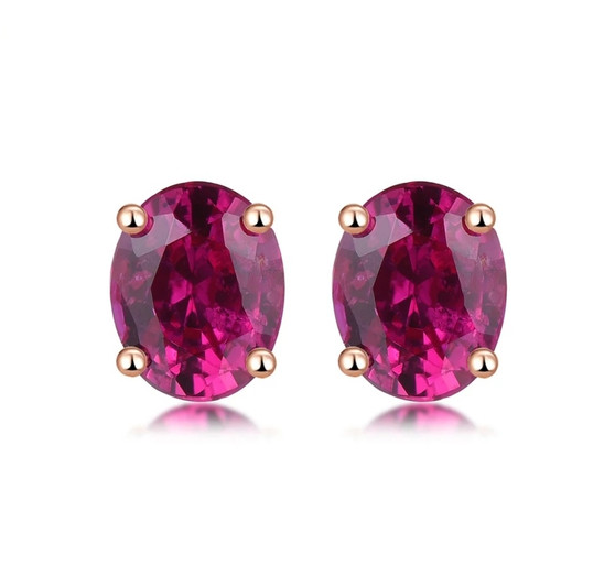 untreated natural oval ruby stud earrings in 14k rose gold