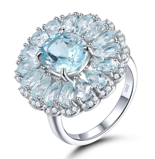 aquamarine and white zircon halo ring in rhodium over sterling silver