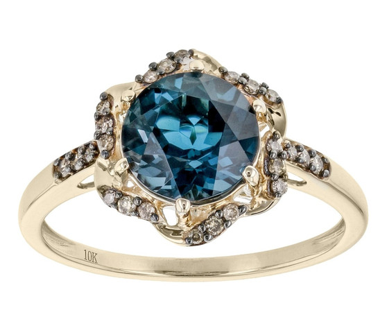 front view of london blue topaz and champagne diamond halo ring in 10k yellow gold