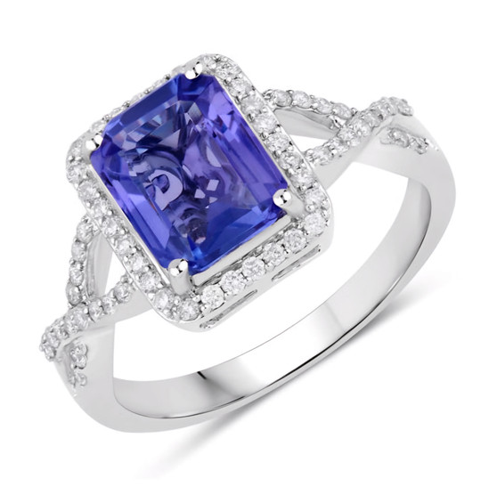 emerald cut tanzanite and diamond halo ring in 14k white gold