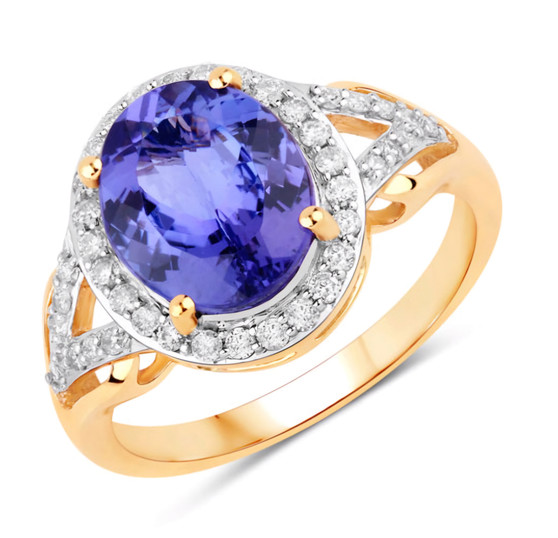 tanzanite and diamond halo split shank ring in 14k yellow gold