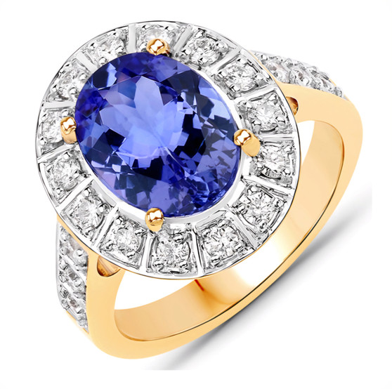 oval tanzanite and diamond halo ring in 14k yellow gold