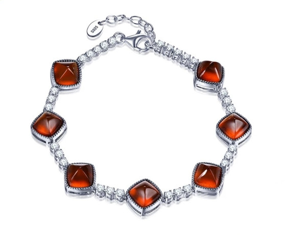 sugar loaf cut hessonite garnet and white zircon tennis bracelet in rhodium over sterling silver