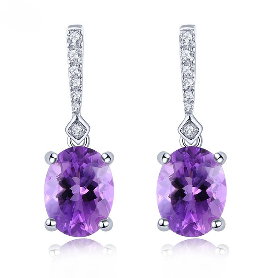 amethyst and white zircon dangle earrings in rhodium over sterling silver
