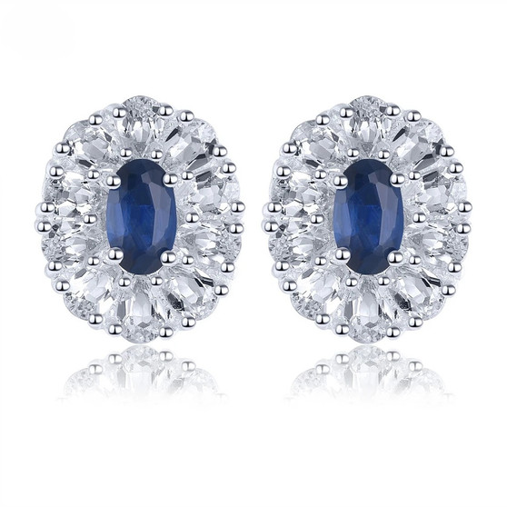 blue sapphire and white zircon halo stud earrings in rhodium over sterling silver