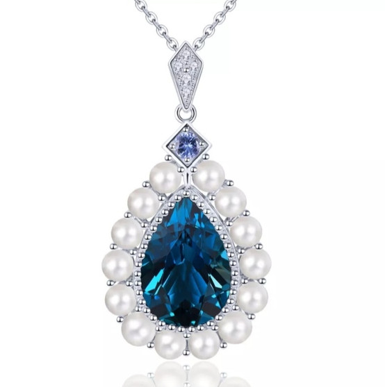 blue topaz and pearl pendant necklace in rhodium over sterling silver