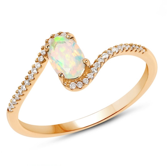front view of ethiopian opal and diamond bypass ring in solid 14k yellow gold