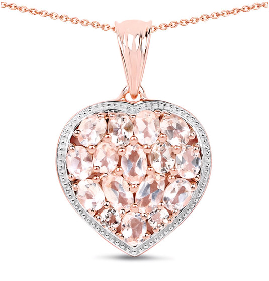close up of morganite and pink chalcedony reversible heart shaped cluster pendant necklace in 14k rose gold over sterling silver