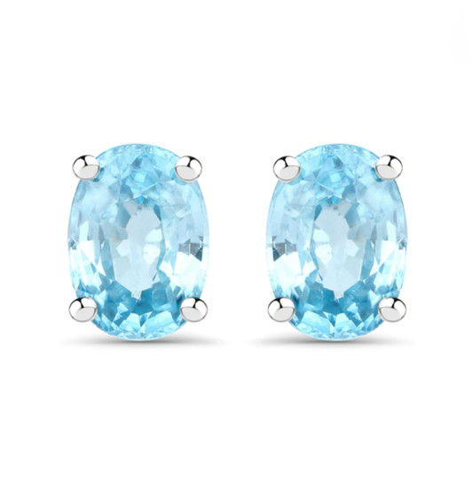 blue zircon 7x5mm oval stud earrings in rhodium over sterling silver