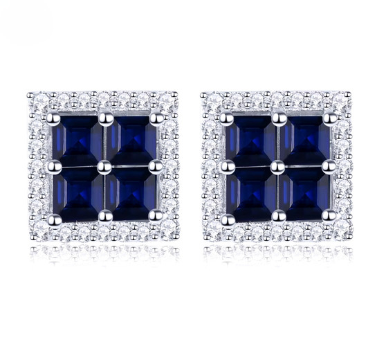 blue sapphire and white zircon halo stud earrings in rhodium over sterling silver