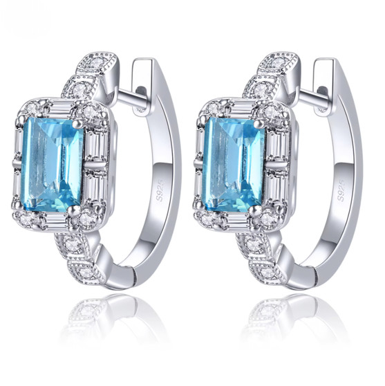 sky blue topaz and white zircon hoop earrings in rhodium over sterling silver