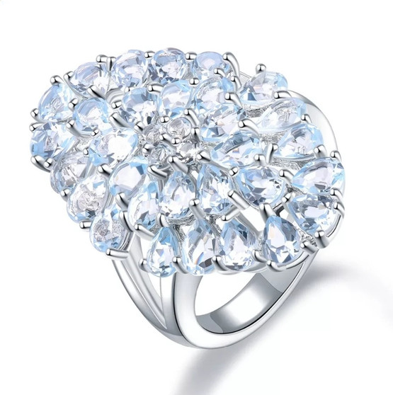sky blue topaz cluster ring in rhodium over sterling silver
