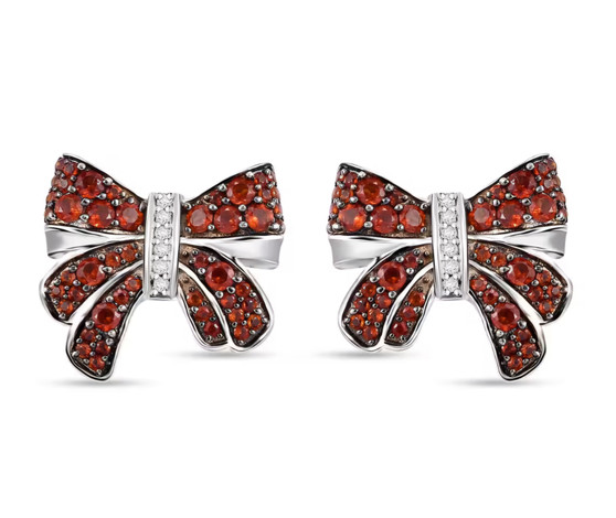garnet and white zircon bow stud earrings in black and white rhodium over sterling silver