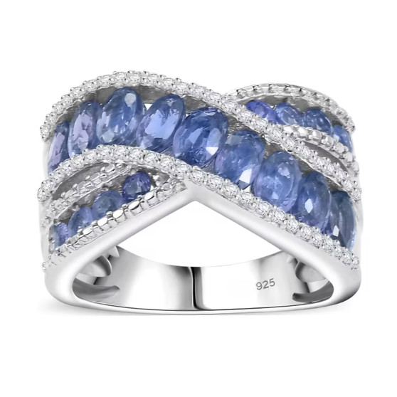 blue sapphire and white zircon crossover band ring in rhodium over sterling silver