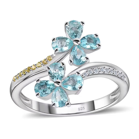 blue apatite yellow sapphire and moissanite flower bypass ring in rhodium over sterling silver