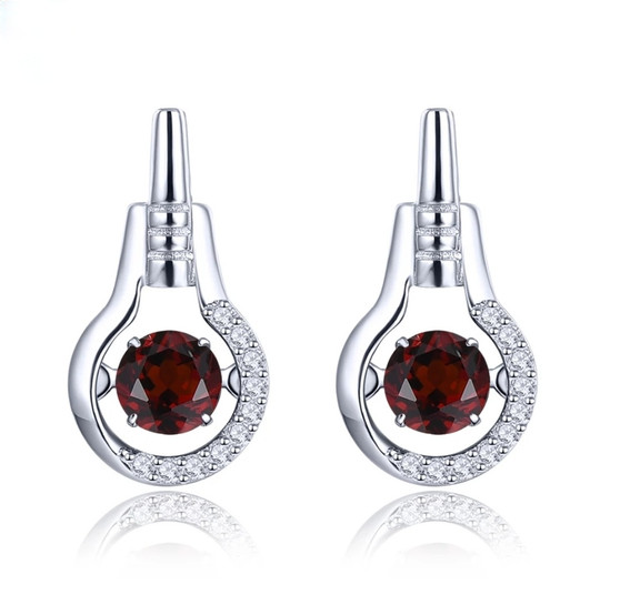 dancing garnet and white zircon dangle earrings in rhodium over sterling silver