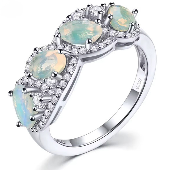 ethiopian opal and white zircon ring in rhodium over sterling silver
